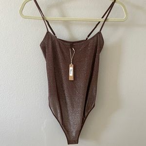 Skims shimmer body suit NWT!